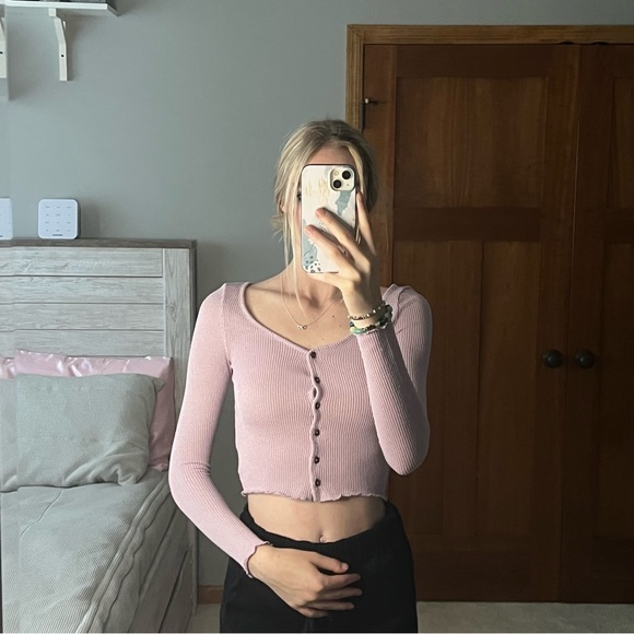 Tops - Cropped, fitted, knit cardigan with a V-neck, buttons at front, long sleeves.